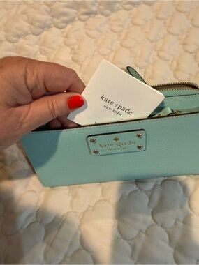 kate spade mint green pebble leather wristlet with gold hardware